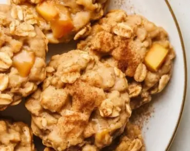 Delicious caramel apple oatmeal cookies served on a rustic table.