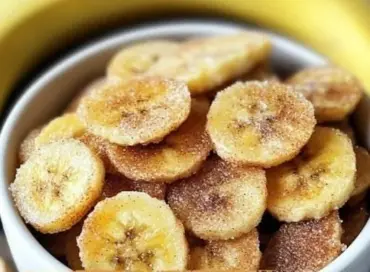 Crispy cinnamon sugar air fryer banana chips in a bowl